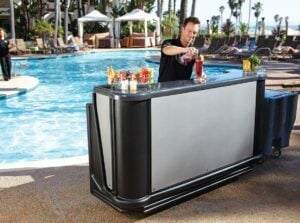 Man serving drinks by the pool