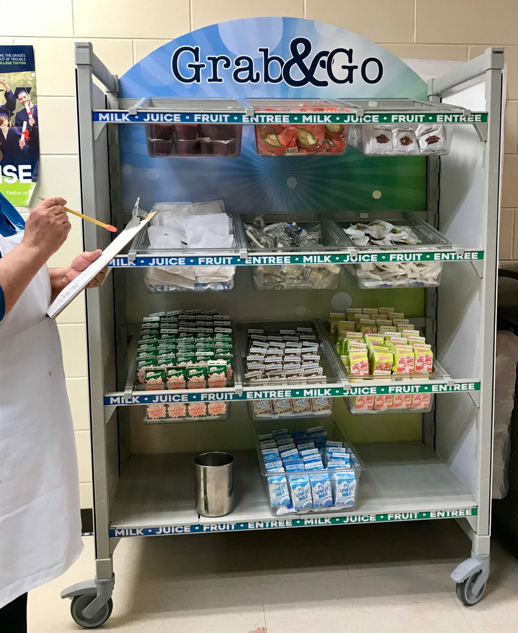 shelf cart on wheels delivering lunch items to students