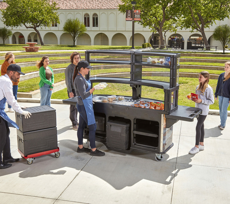 kids at school getting food and drinks from mobile cart kiosk